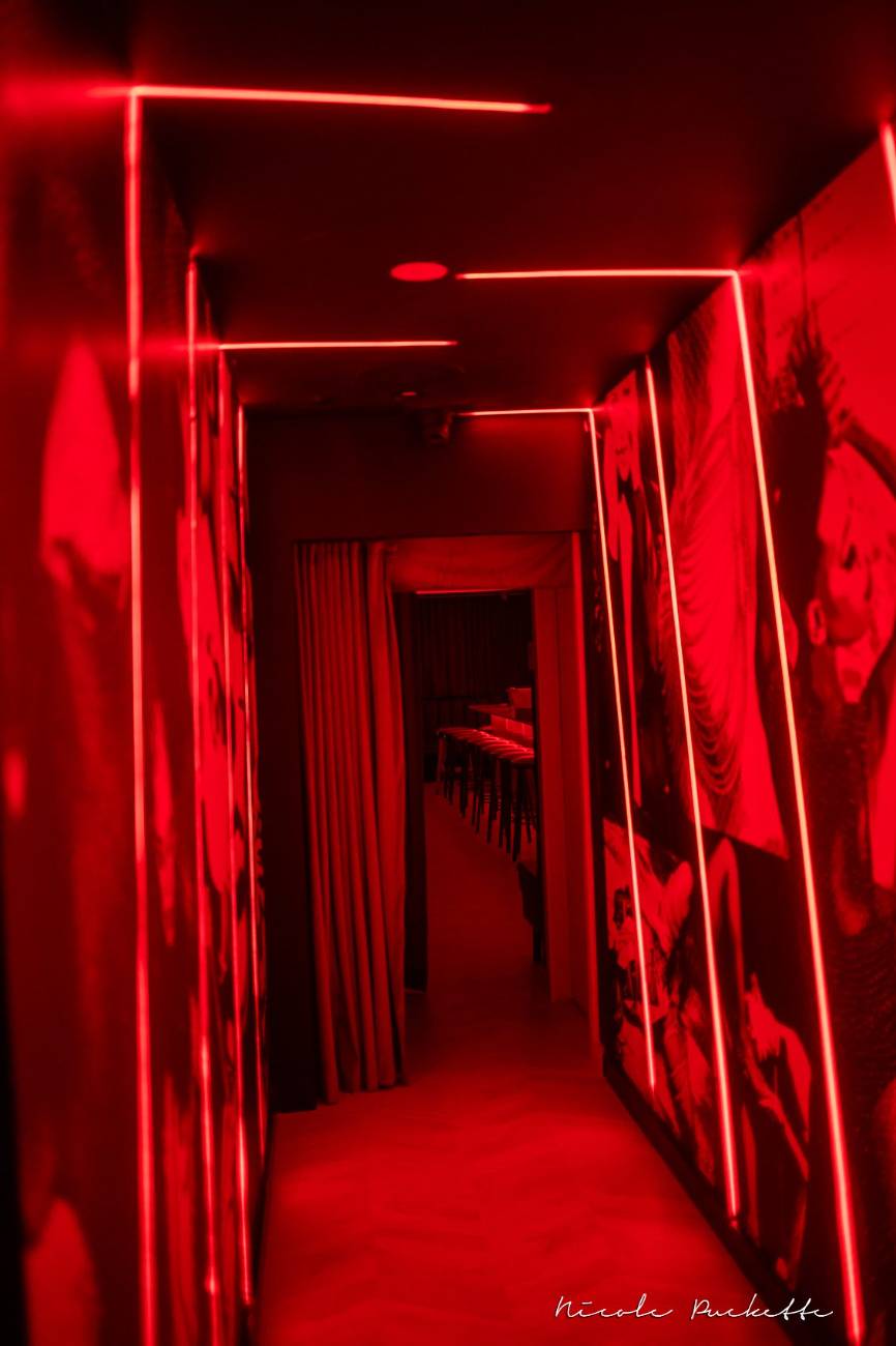 The red-lit passage to the Red Room
